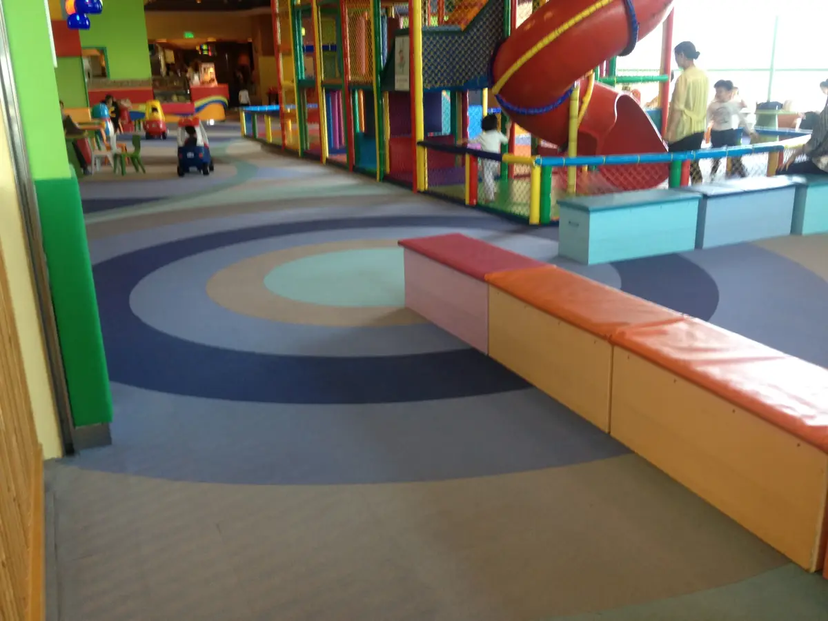 Soft, washable flocked flooring in a children's play and activity space